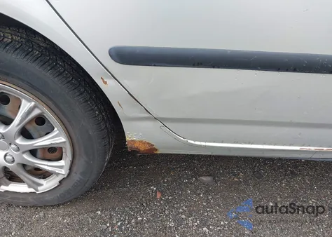 2003 Toyota Corolla Ce z USA, uszkodzony, nr VIN JTDBR32E732000191